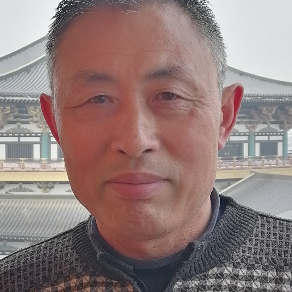 默默笑的照片
