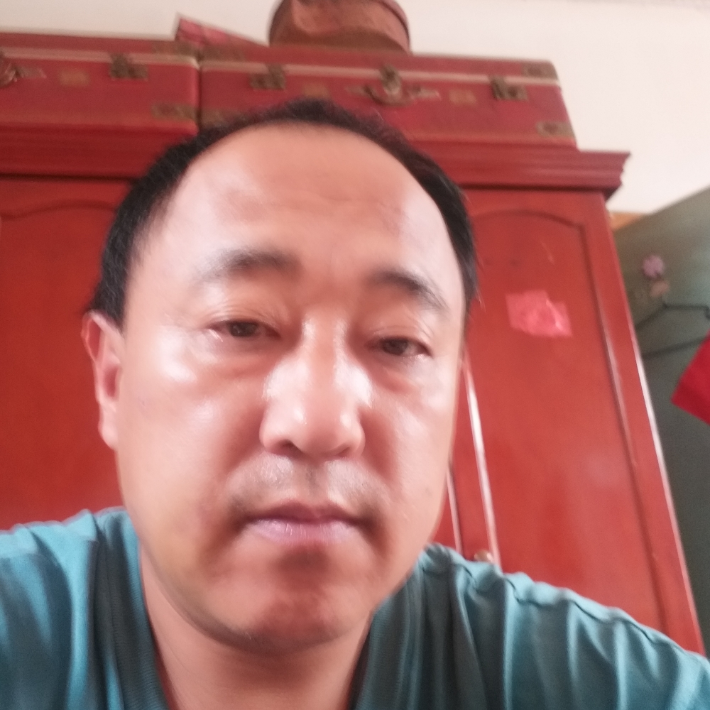 放包袱下的照片