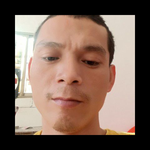 迷人笑余溫的照片