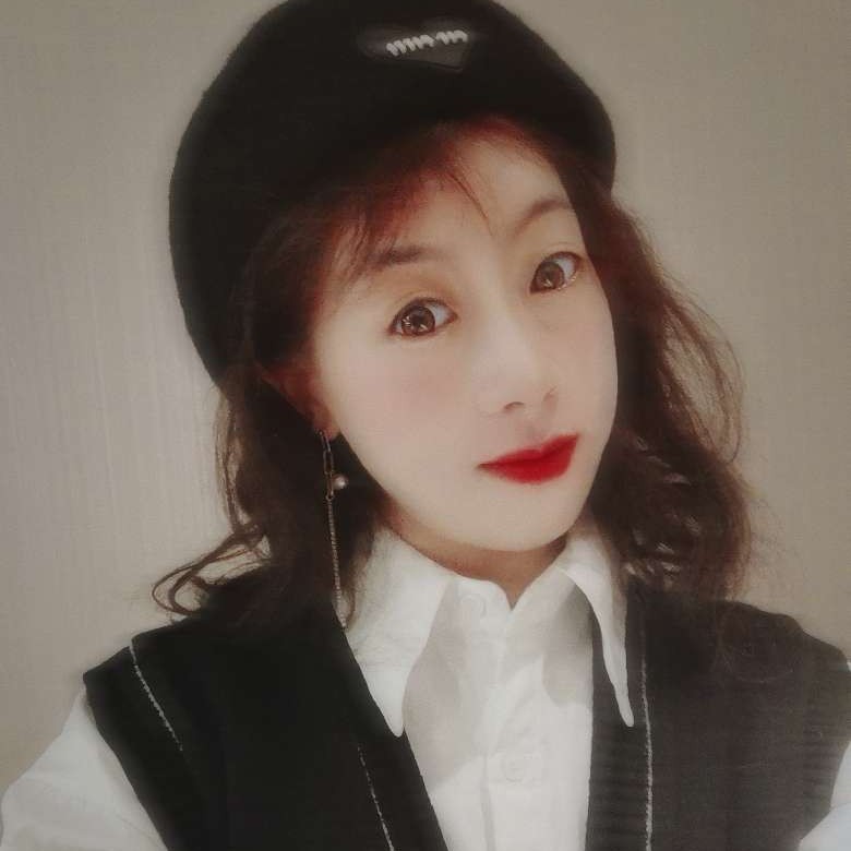 娜个小妖e的照片