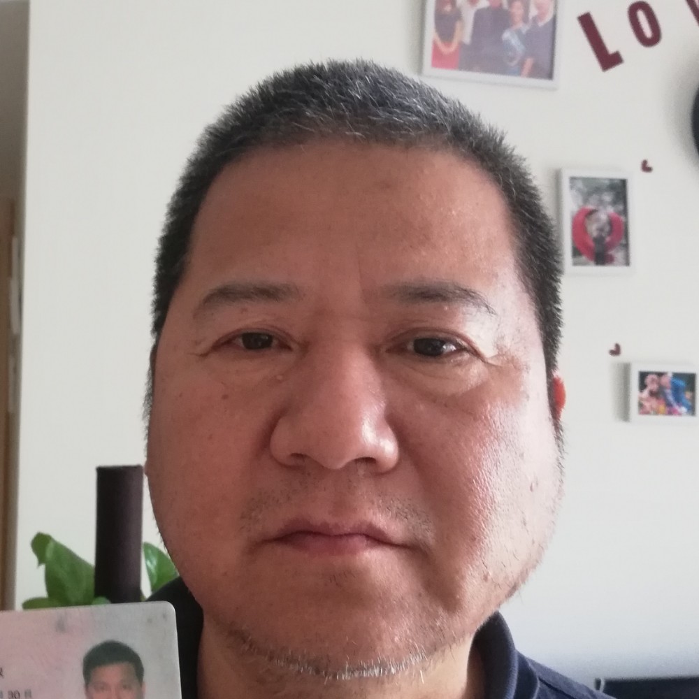 大叔默默的照片