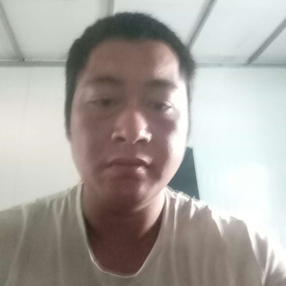 小丸子拿伶俐的照片