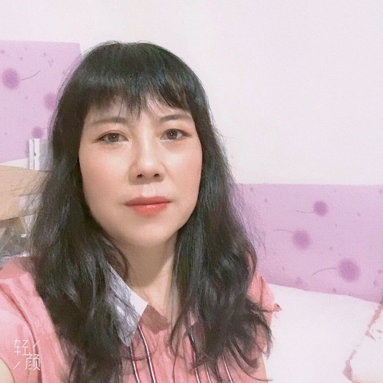 舒荷包容的照片