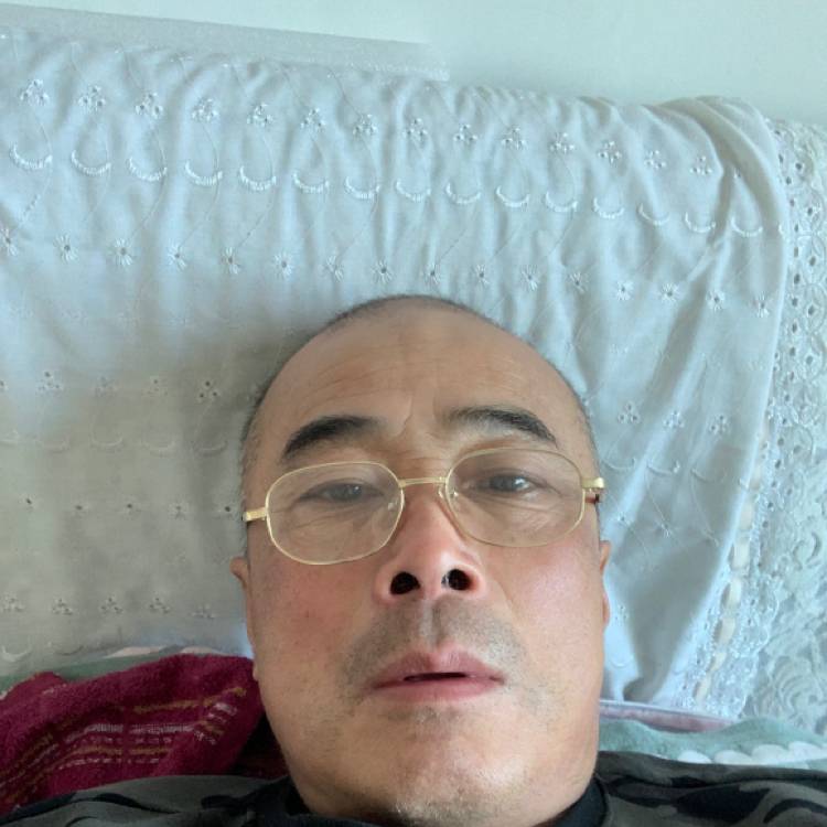 魁梧向鲜花的照片