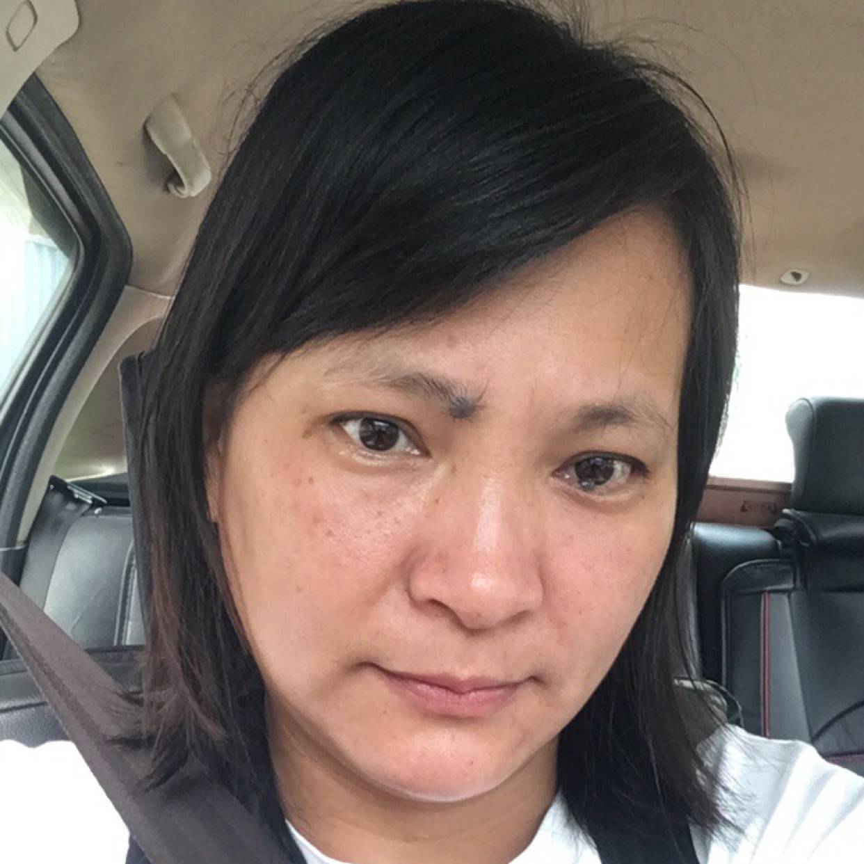 悠然在笑的照片