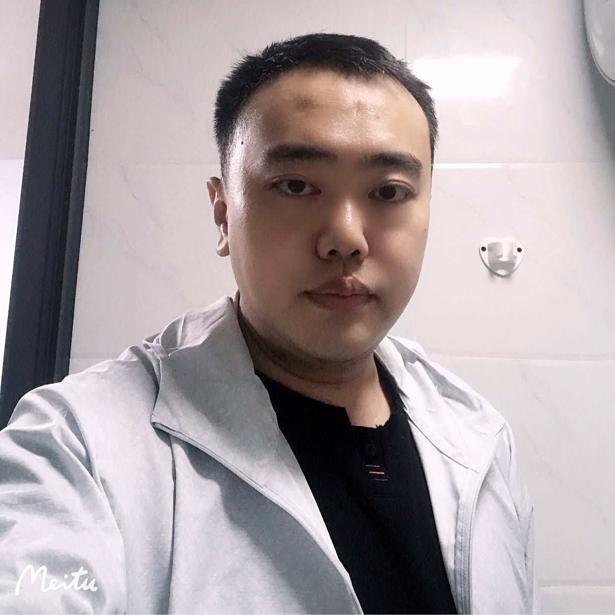 覃天的照片
