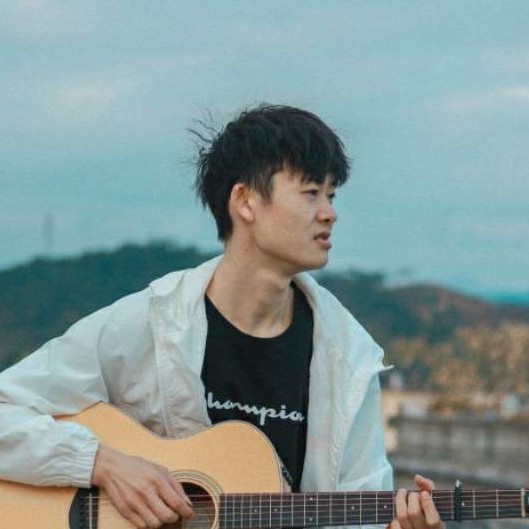 吉他少年的照片