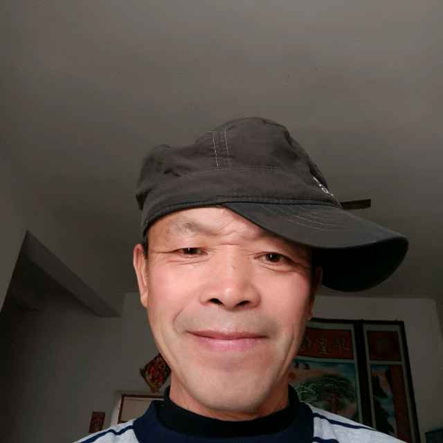 李炽明的照片