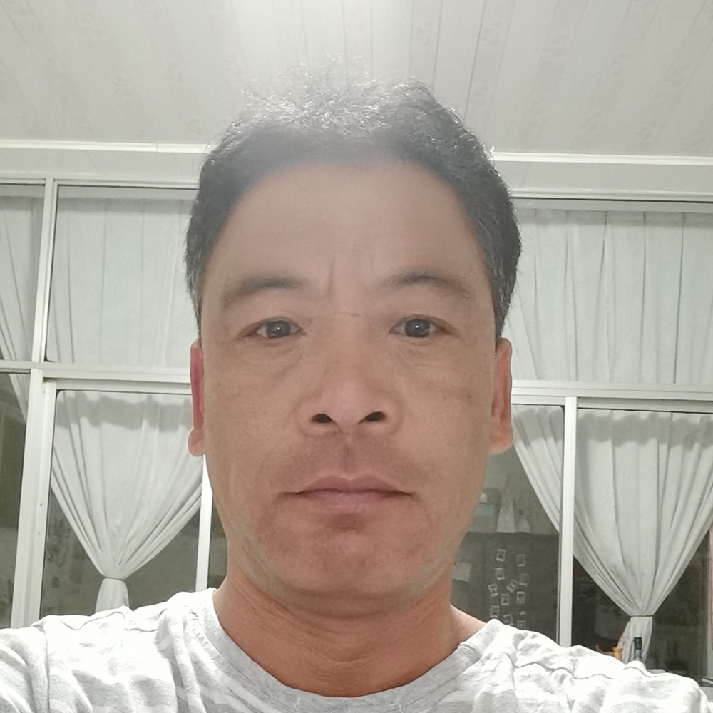 正阳门下的大男人的照片