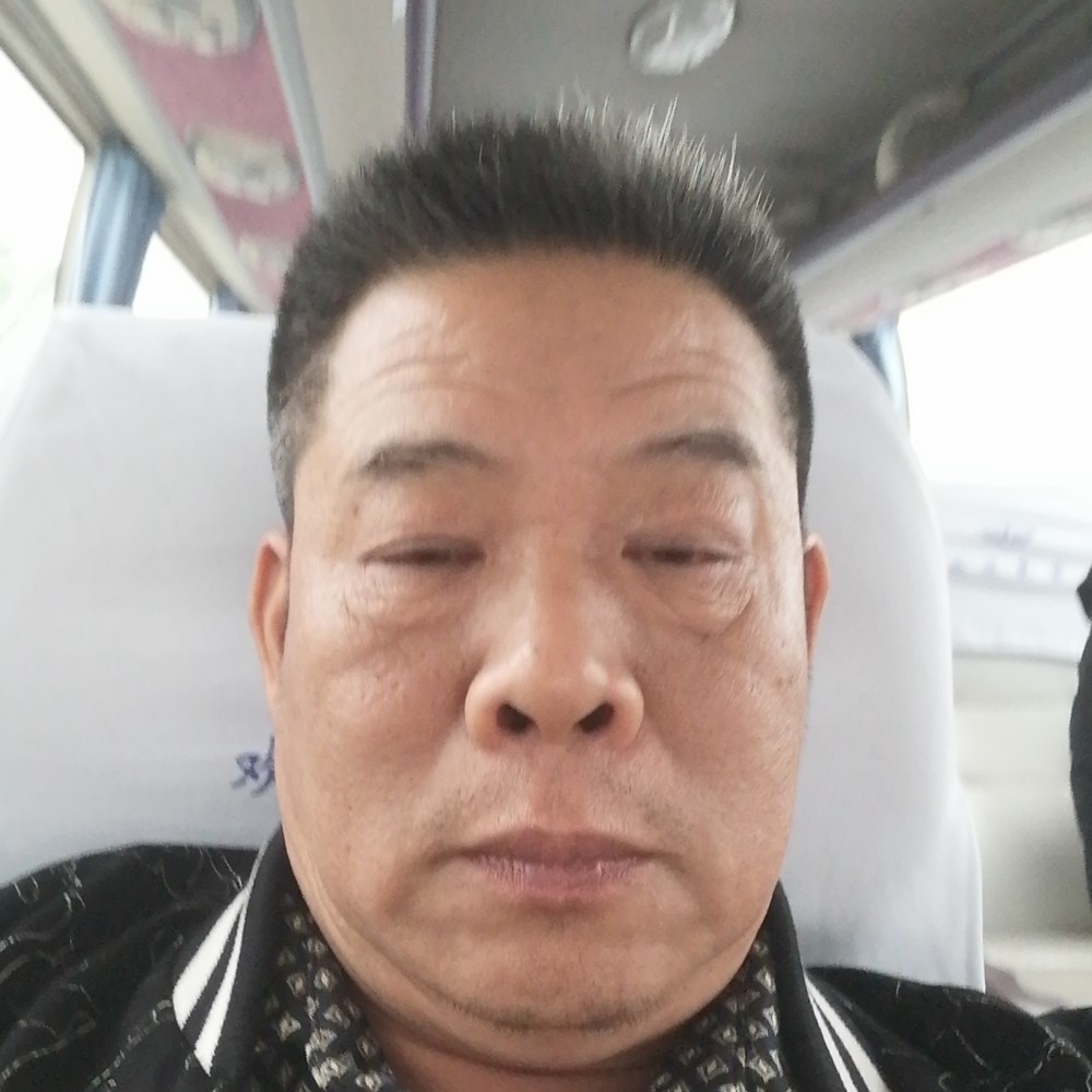 覃志勇的照片
