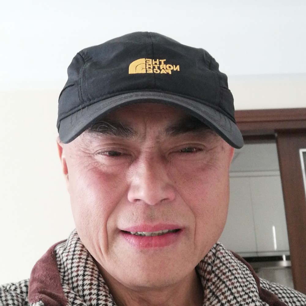 微笑在苦旅的照片