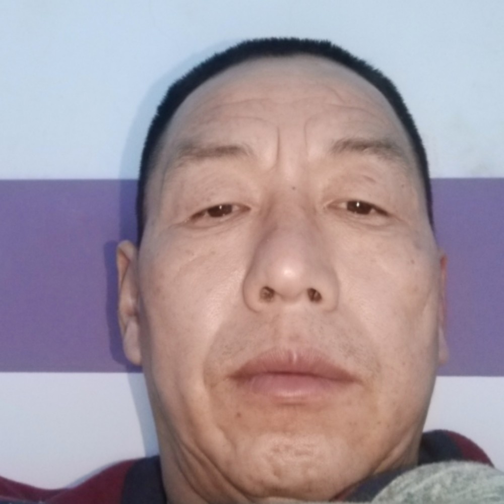 老师那专注的照片