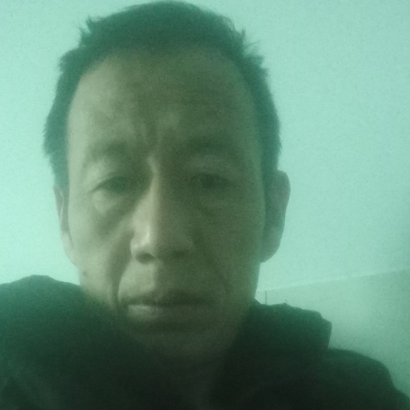 苹果拿浮光的照片