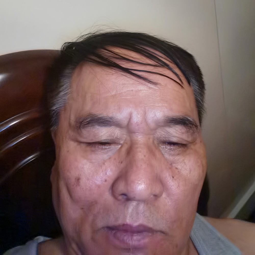 康乃馨拿动听的照片