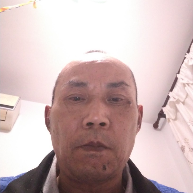 顾建芳的照片
