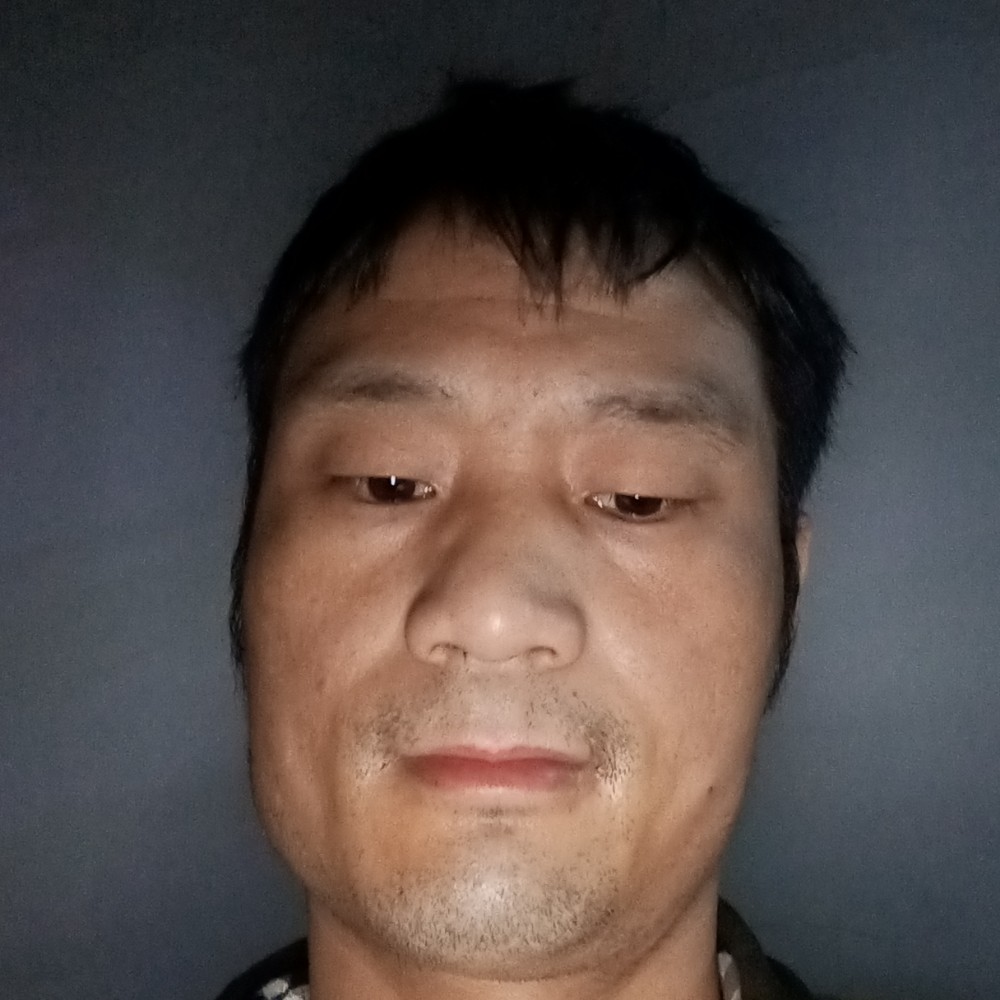 长颈鹿笑淡淡的照片