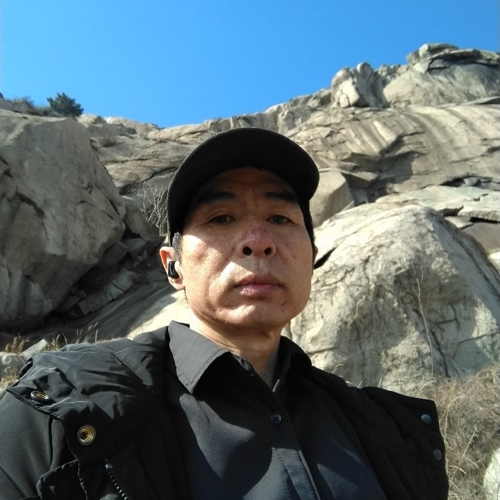 大叔就执着的照片