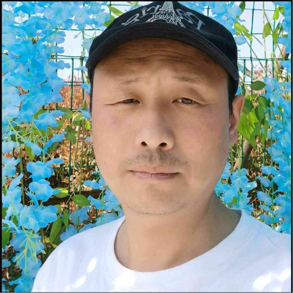 天真拿大侠的照片