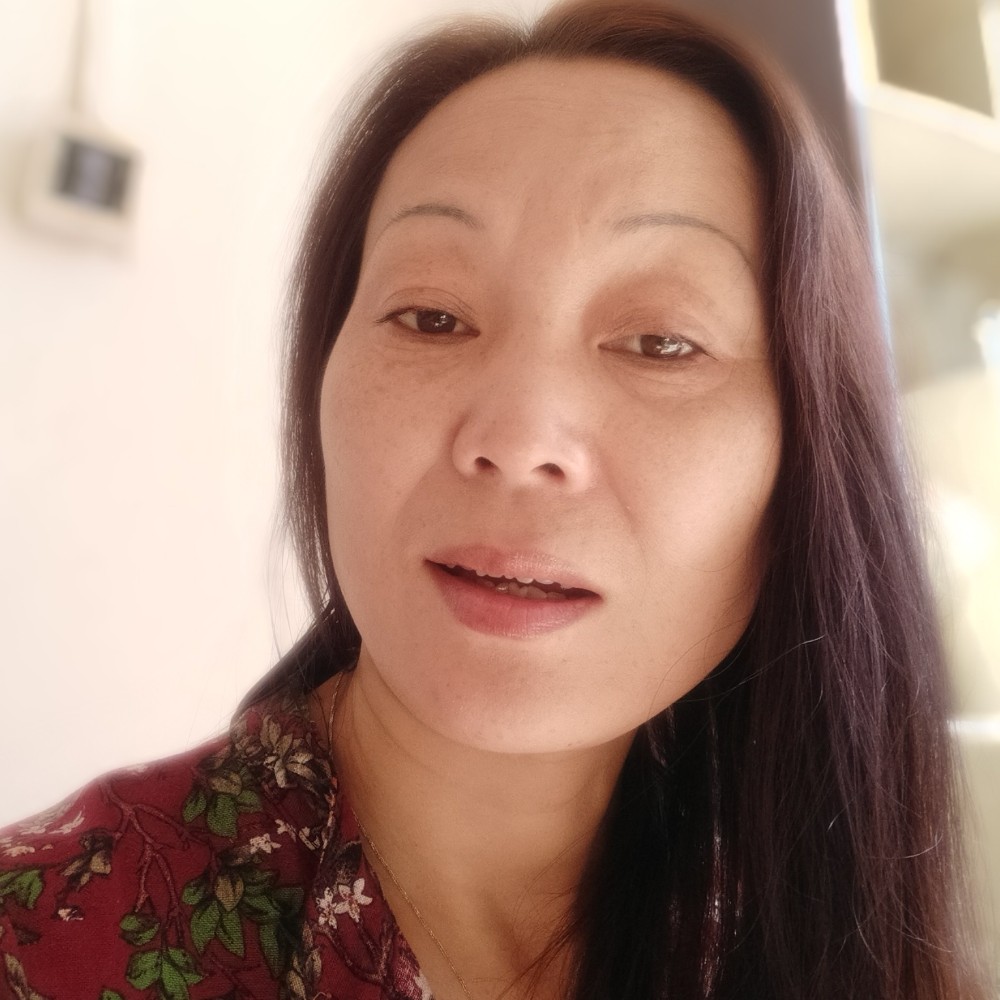 简单羽裳的照片
