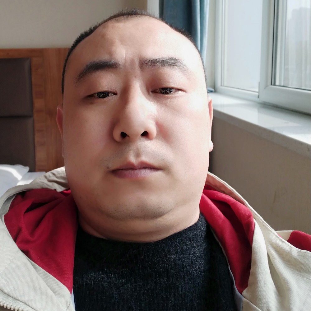 骑猪赶大朗的照片