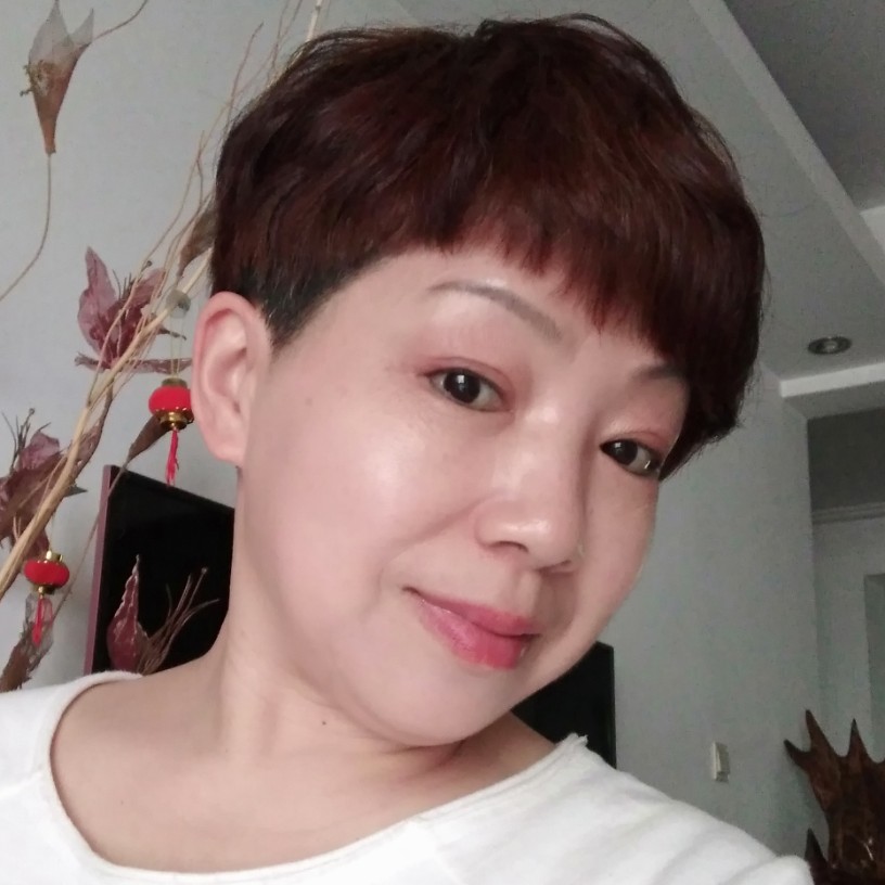甜美邂逅荷花的照片