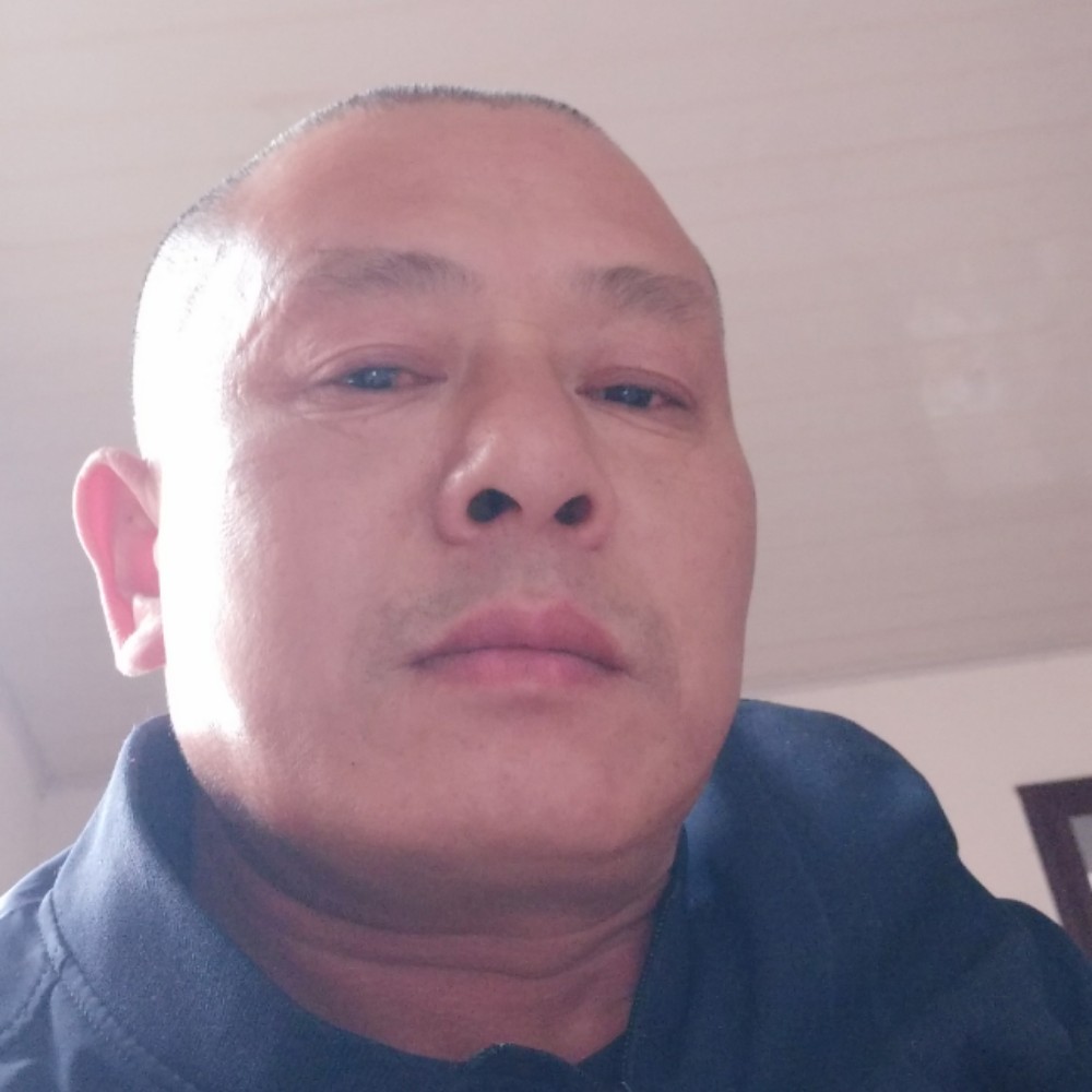 隐忍招牌辉的照片