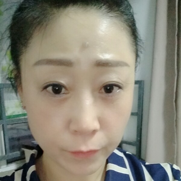 低头✘浅笑的照片