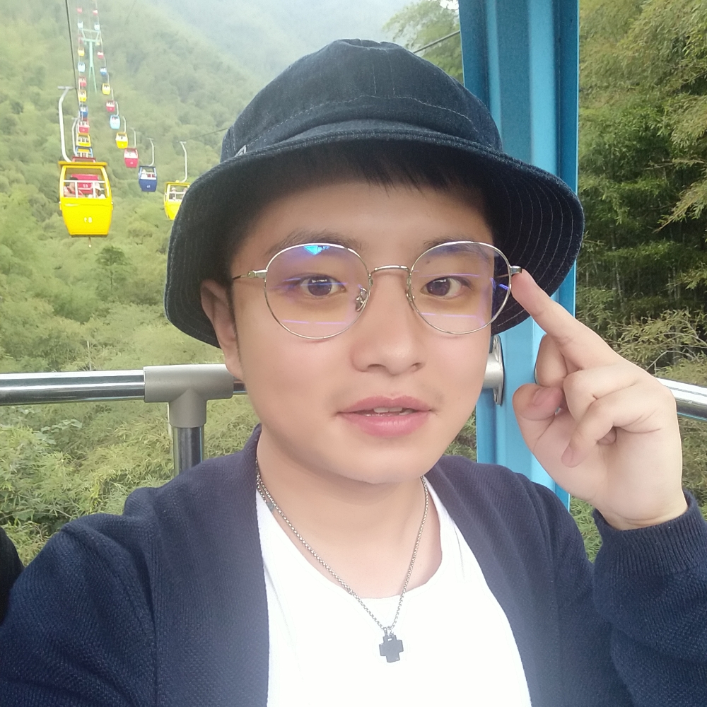 谁眼角朱红的泪痣的照片
