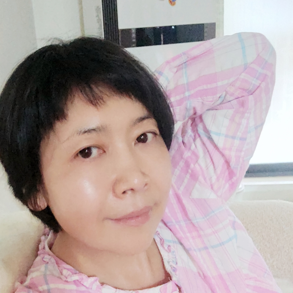 微笑闻细心的照片