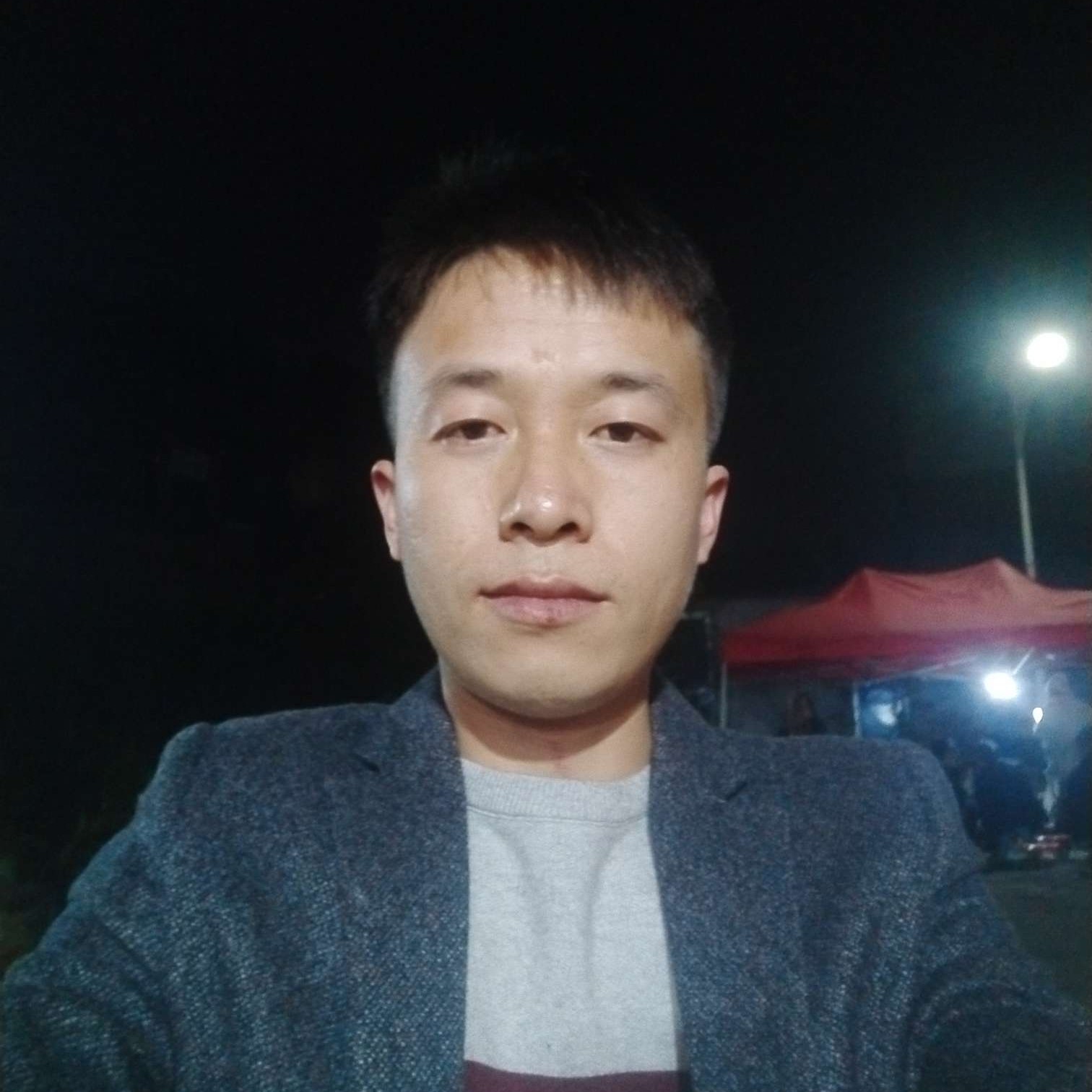 彼年闻可乐的照片