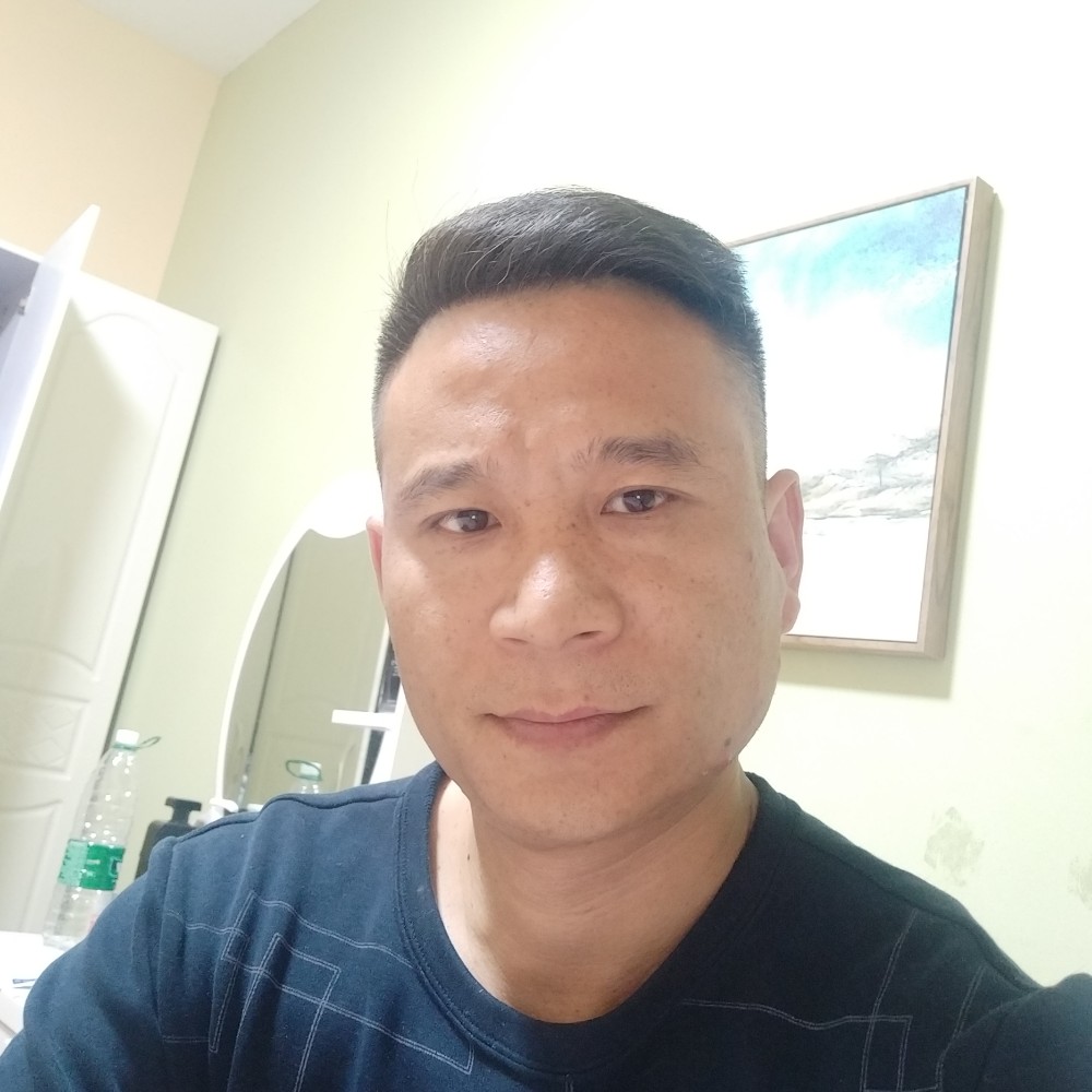 周茂明的照片