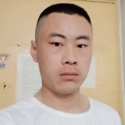 华明柱的照片