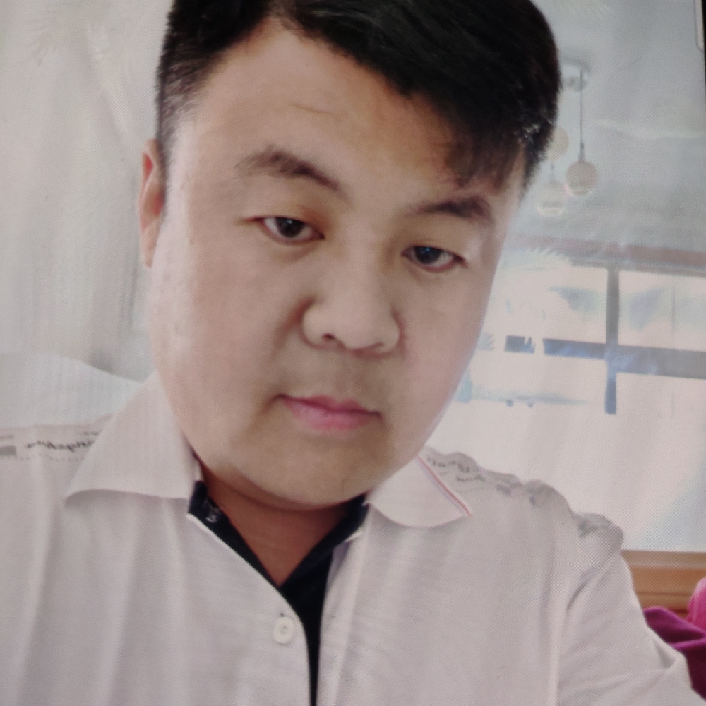 马洪理的照片