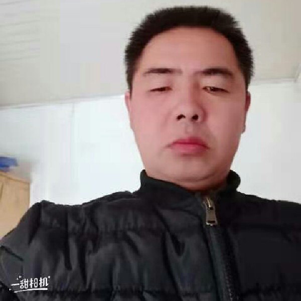 英俊打煎饼的照片