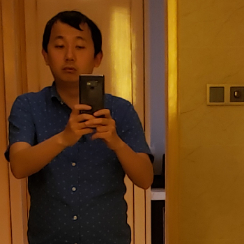 橙色纸飞机的照片