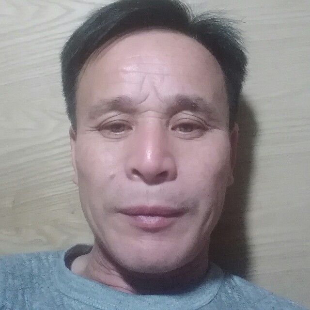 无聊笑大叔的照片