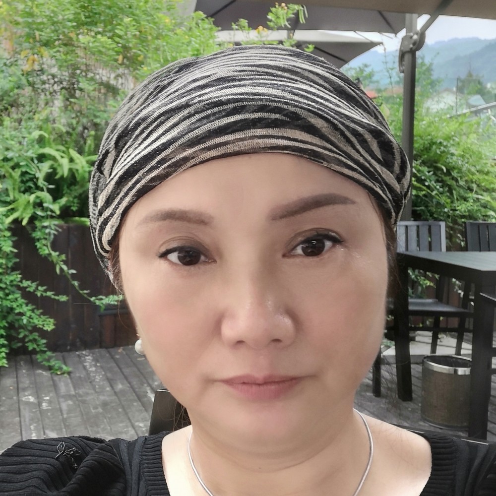 女人花热爱生活的照片