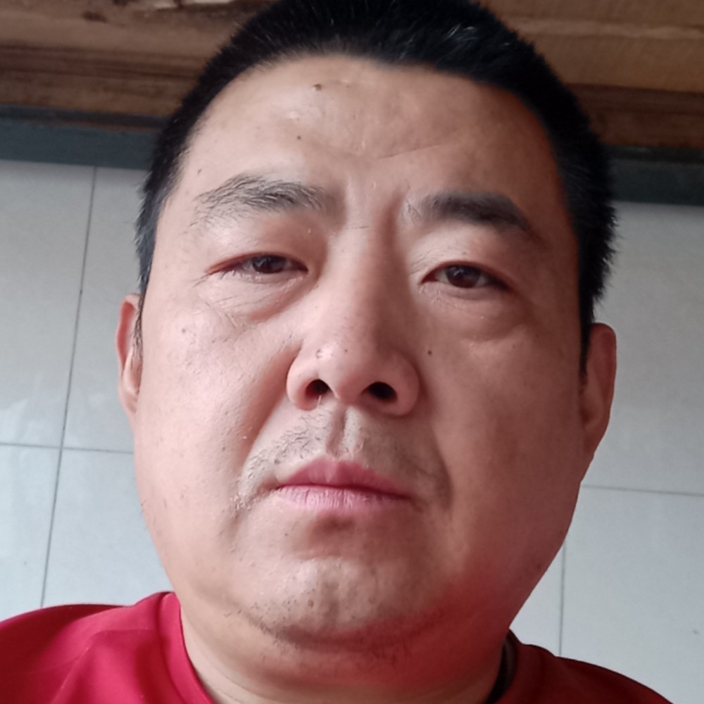 自觉拿火龙果的照片